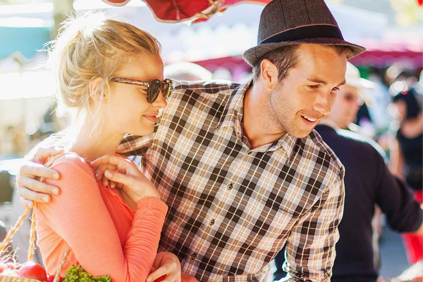 Couple shopping at fruit stall